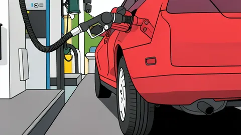 A fuel pump nozzle resting on a concrete forecourt