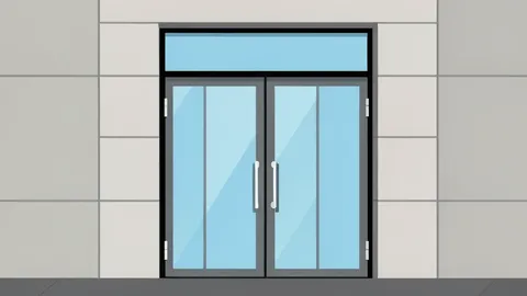 A modern bank branch entrance with glass doors and a polished stone facade