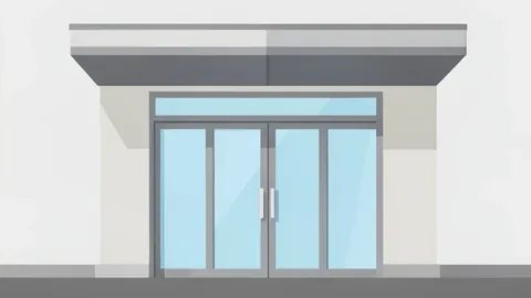 A modern bank branch facade with glass doors and a metal canopy