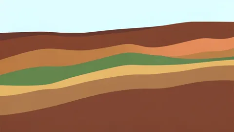 A geological cross-section of earth strata containing mineral deposits