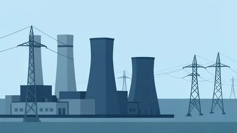 A large industrial power generation facility with cooling towers and transmission lines