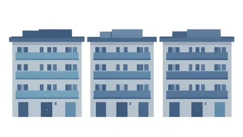 A row of multi-story apartment buildings with balconies