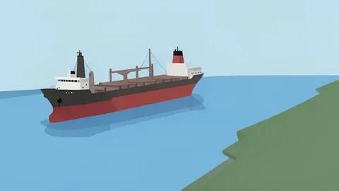 A large oil tanker ship floating on the sea near a narrow strait