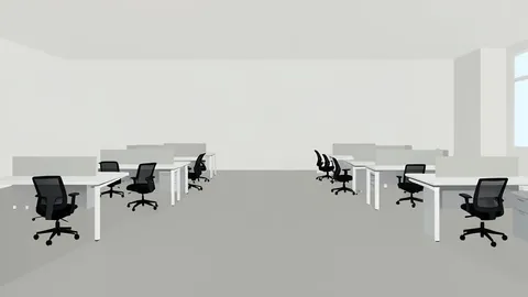 A row of empty office desks with ergonomic chairs in a large, open-plan studio space