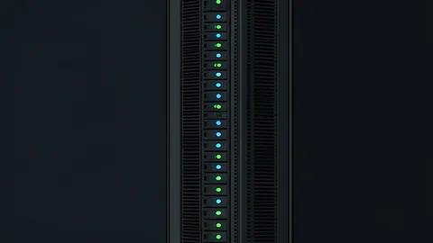 A server rack with blinking status lights in a dark room