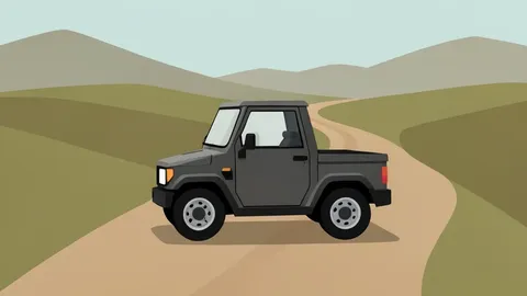 A small, rugged electric utility vehicle parked on a dirt road