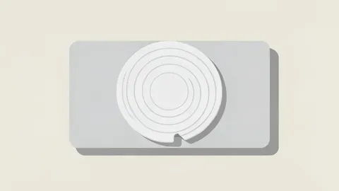 A silicon wafer resting on a cleanroom tray