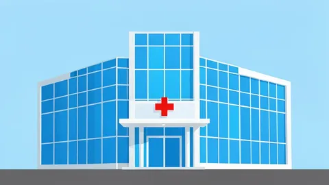 A modern hospital building with a glass facade and a red cross symbol on the entrance
