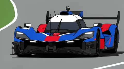 A low-profile endurance racing car with a large rear wing parked on a tarmac pit lane.