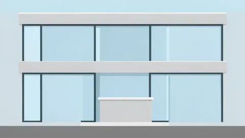 A modern insurance office building with large glass windows and a reception desk