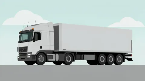 A large commercial semi-truck parked in a logistics yard