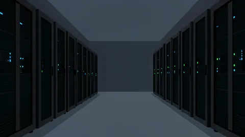 Rows of black server racks with blinking status lights in a dimly lit data center