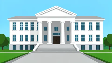 A large traditional government building with a red facade and a large gate situated in a city square.