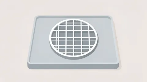 A silicon wafer resting on a cleanroom tray