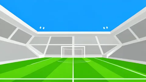 A vast, empty football stadium with lush green grass and white goalposts under a clear sky.