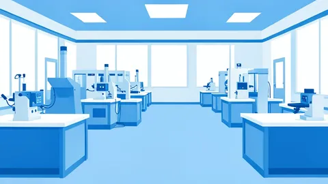 A cleanroom training facility with rows of industrial machinery and workstations