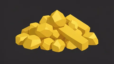 A collection of raw gold nuggets and bars resting on a dark surface.