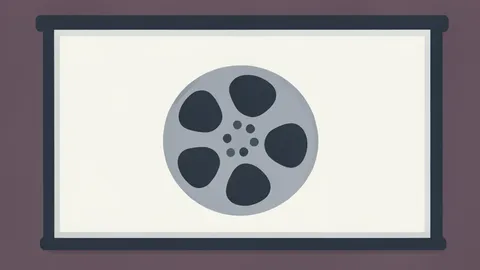 A large cinema projection screen displaying a film reel