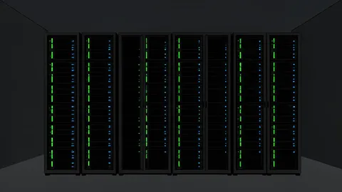 Rows of black server racks with glowing status lights in a dark room