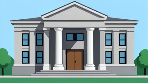 The exterior facade of a modern courthouse building with columns