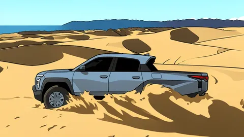 A rugged electric pickup truck with an open cargo bed parked on a dusty off-road trail
