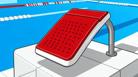 A competitive swimming pool with lane ropes and starting blocks