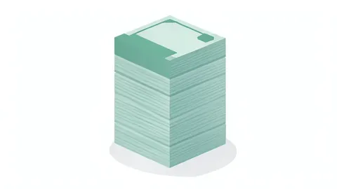 A neat stack of paper currency bills on a plain surface