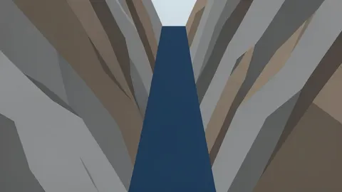 A narrow, deep waterway cutting through rugged, rocky terrain with steep cliffs on either side