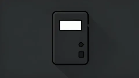 A rugged, matte-black hardware wallet device with a small monochrome display and physical buttons, resting on a dark surface.