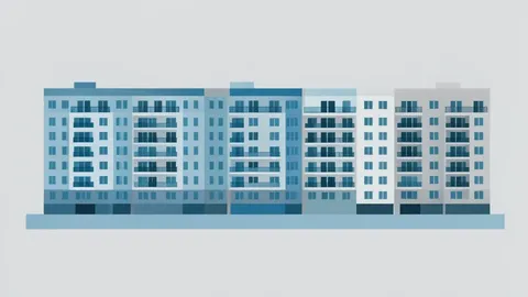 A row of multi-story residential apartment buildings with balconies