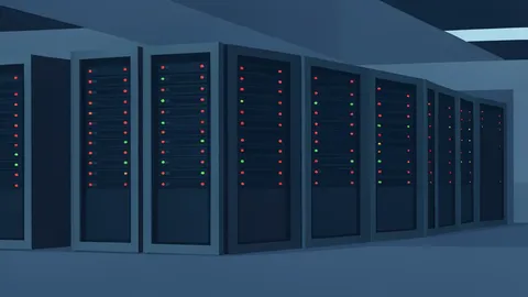 A row of industrial server racks with blinking status lights in a dimly lit data center