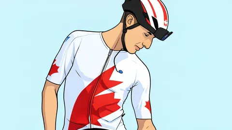 A cyclist riding a drop-bar bicycle on a paved road winding through a dense forest.