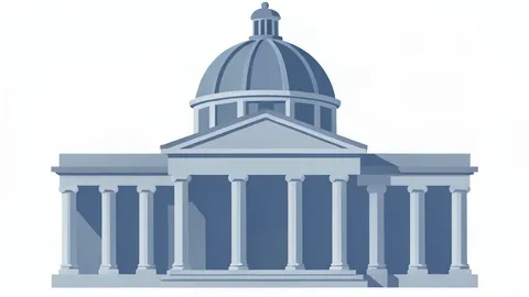 A neoclassical building with a large central dome and a colonnade of tall columns