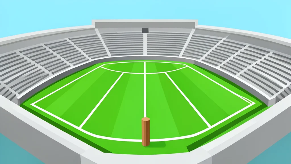 A lush green cricket pitch with white creases and stumps, surrounded by empty stadium stands under a clear sky.
