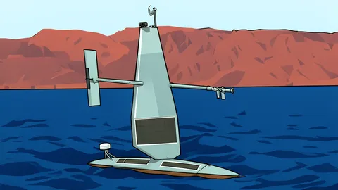A small, unmanned robotic sailboat with a rigid vertical wing floating on open water