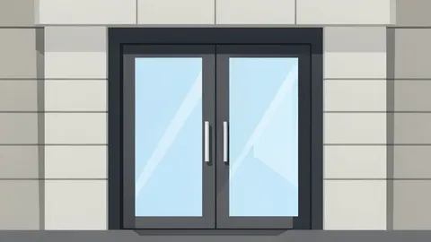 A modern bank branch entrance featuring glass doors and a polished stone facade.