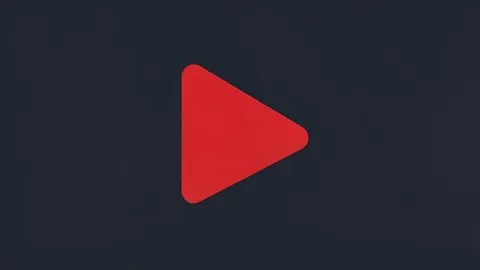 A red play button symbol on a dark background