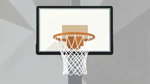 A wooden basketball hoop with a white net hanging from a backboard in an indoor arena