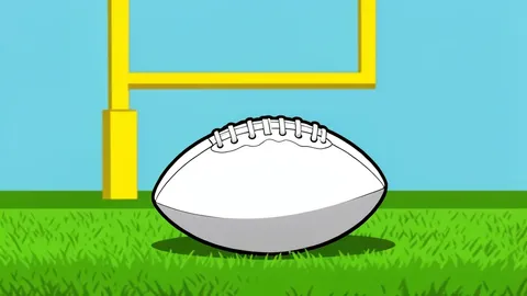 A white football placed on green grass near a yellow goalpost