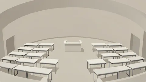A wide view of the United Nations General Assembly Hall with rows of desks and a central podium.
