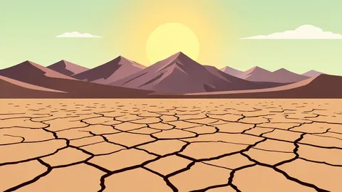 A dry, cracked desert landscape stretching toward a distant mountain range under a harsh sun