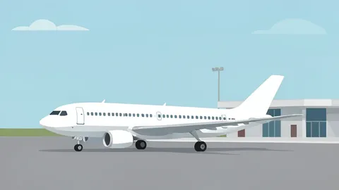 A commercial airplane parked on a tarmac at an airport