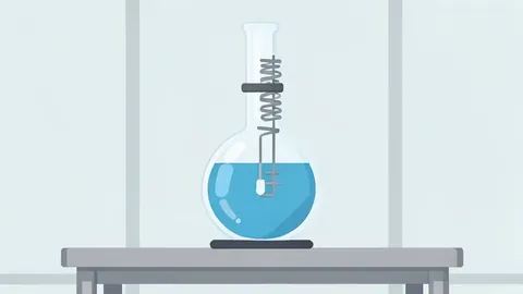 A laboratory glass reactor with a condenser coil, sitting on a stainless steel bench in a cleanroom environment.