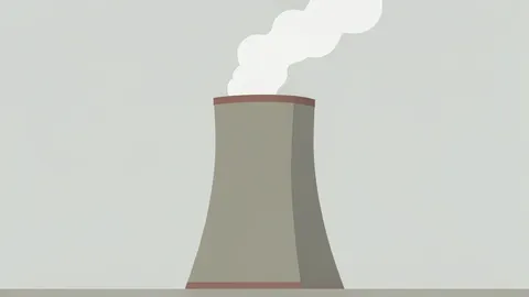 A large industrial cooling tower with steam rising from the top