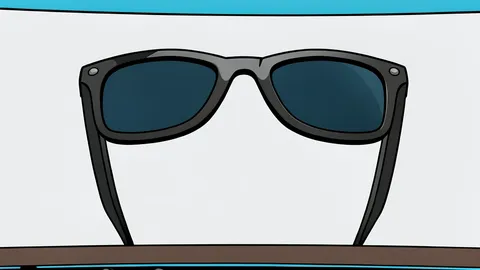 A pair of slim, rectangular eyeglasses with thin metal frames and clear lenses resting on a neutral surface