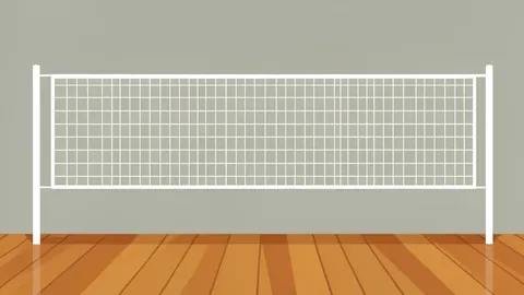 A volleyball net stretched across an indoor arena floor