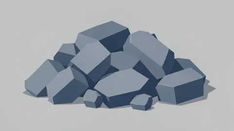 A pile of grey metallic ingots and ore chunks on a concrete floor.